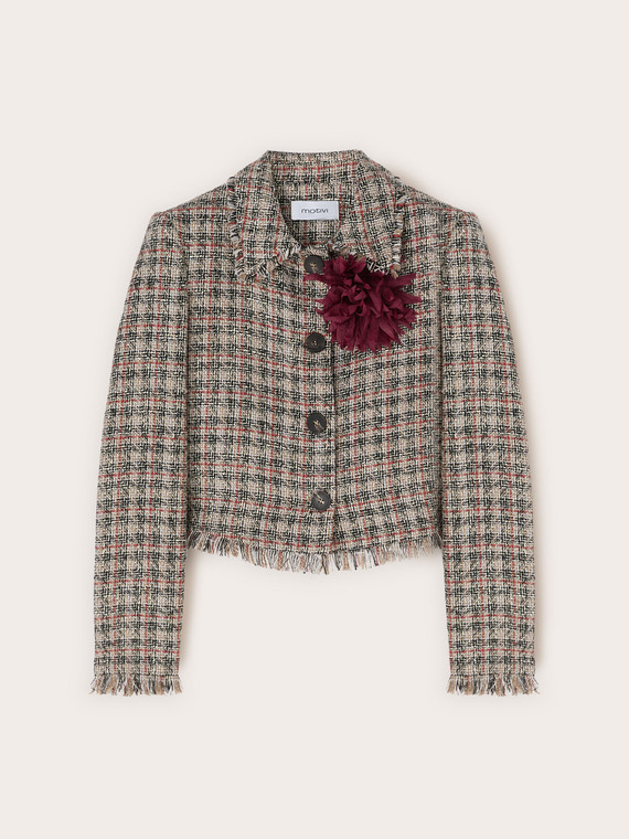 Short boucl&eacute; jacket with fringes and brooch
