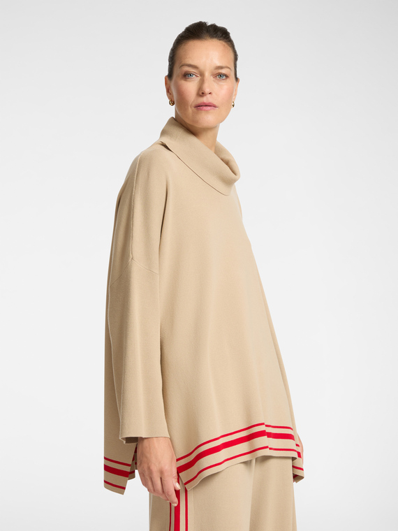 Cape with striped edge