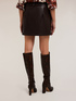Short skirt in coated fabric image number 1
