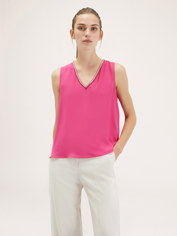 Top elegante con pietre crystal