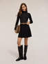 Short knit skirt with appliqués image number 0