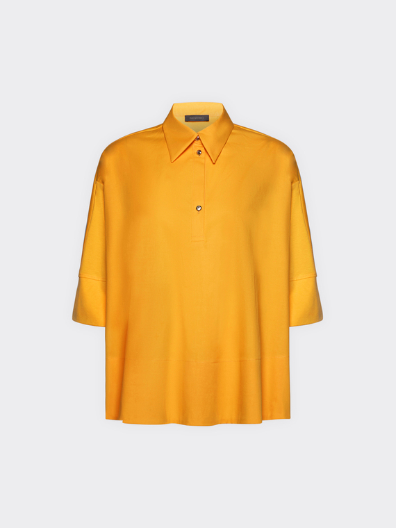 Blusa amplia en dos tejidos