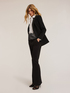 Pantaloni flare in tessuto compatto image number 0