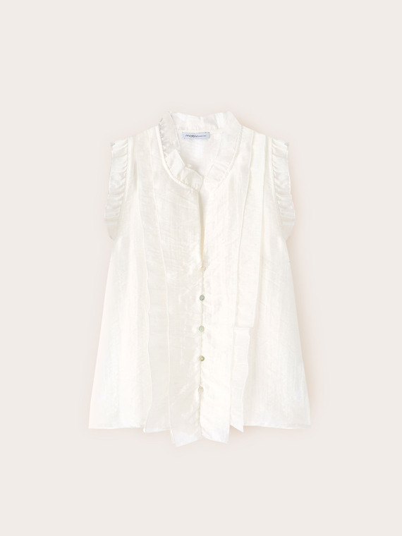 Blusa in mussola con volant
