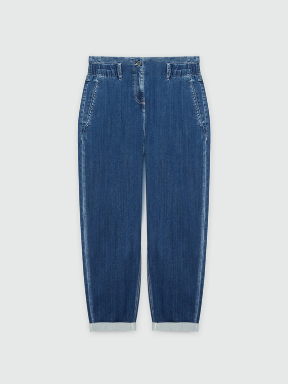 Jeans balloon con impunture a contrasto