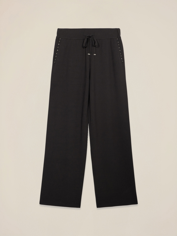 Pantaloni in maglia con castoni