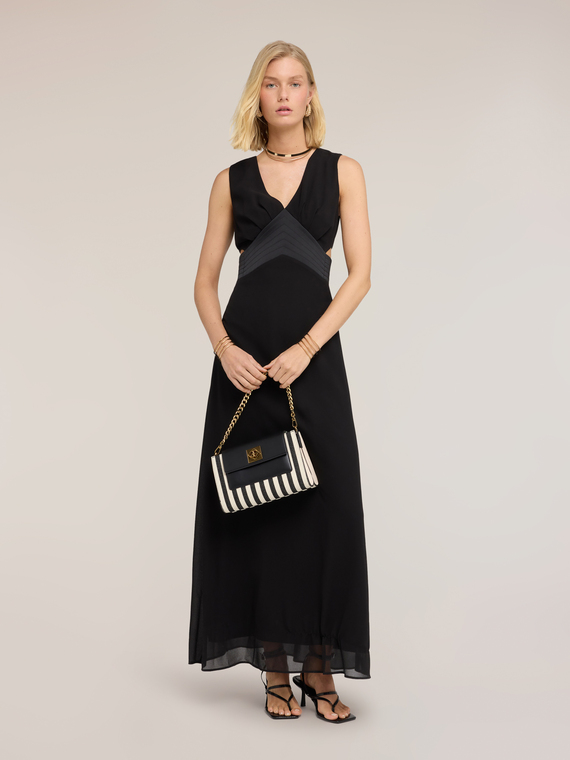 Rochie lungă din georgette cu decupaje