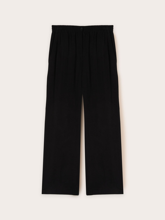 Pantalones fluidos con bajo ajustable