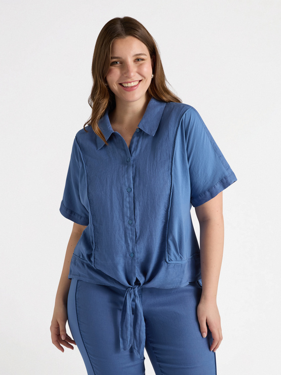 Linen shirt with knot at the bottom