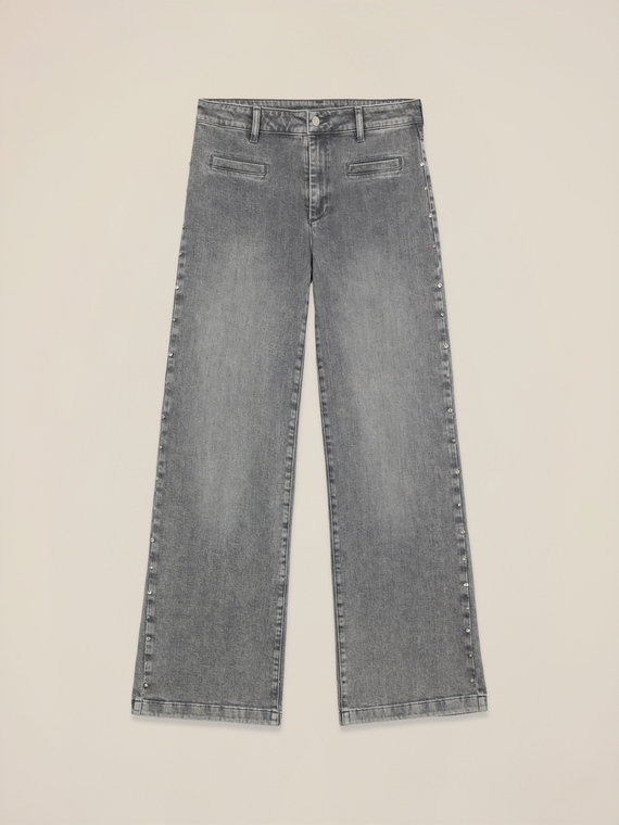 Jeans a palazzo con borchie decorative