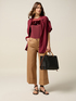 Pantalones cropped con vuelta image number 0