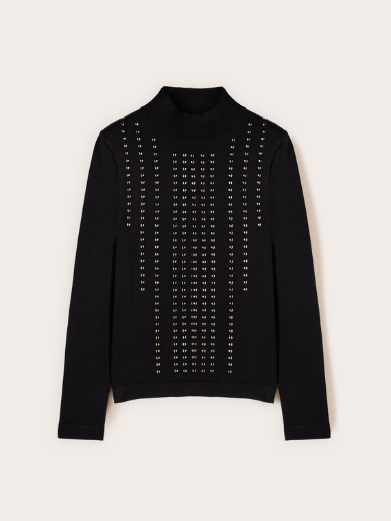 Turtleneck sweater with appliqués