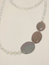Long necklace with pearls and geometric elements image number 1
