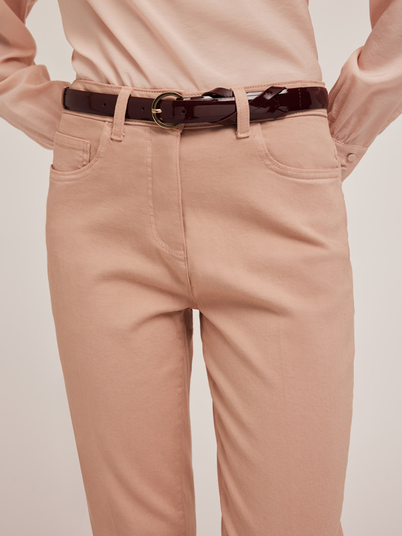 Patent leather belt with crossover keeper loop