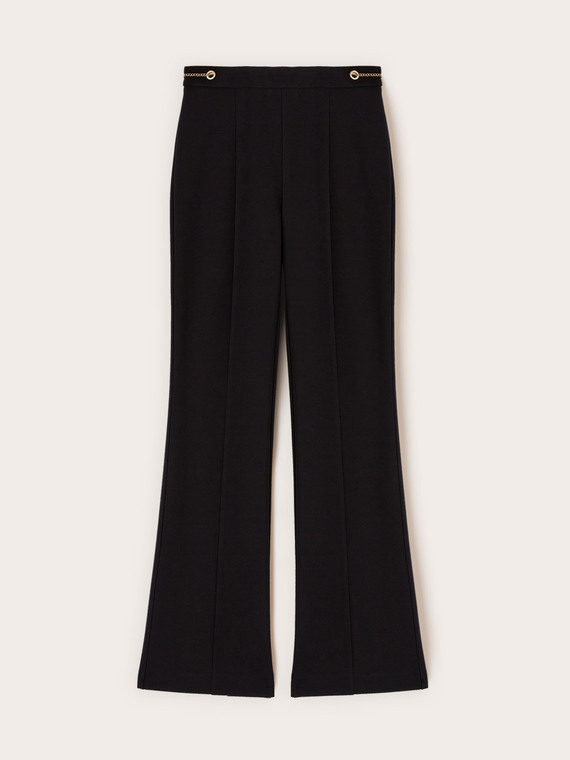 Flare pants with eyelet pattern