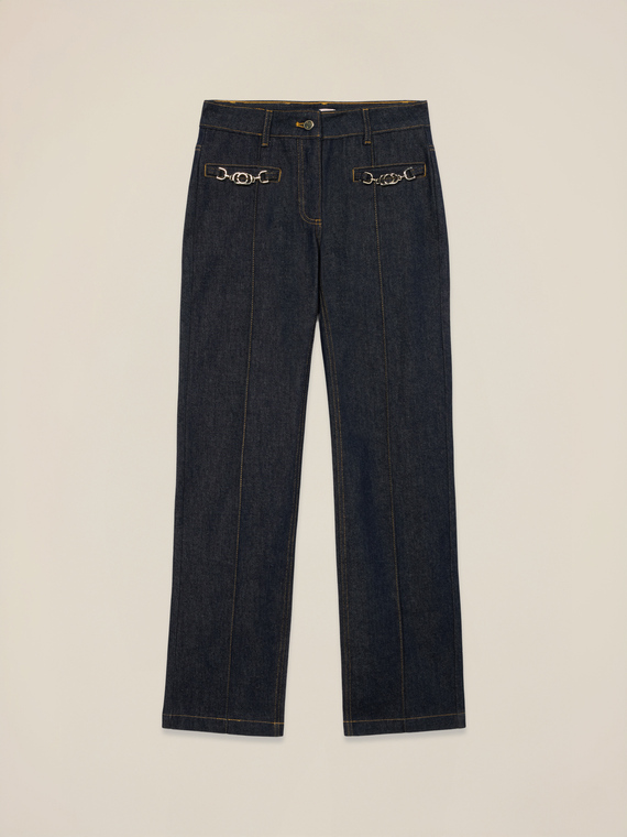 Jeans regular con catene metalliche