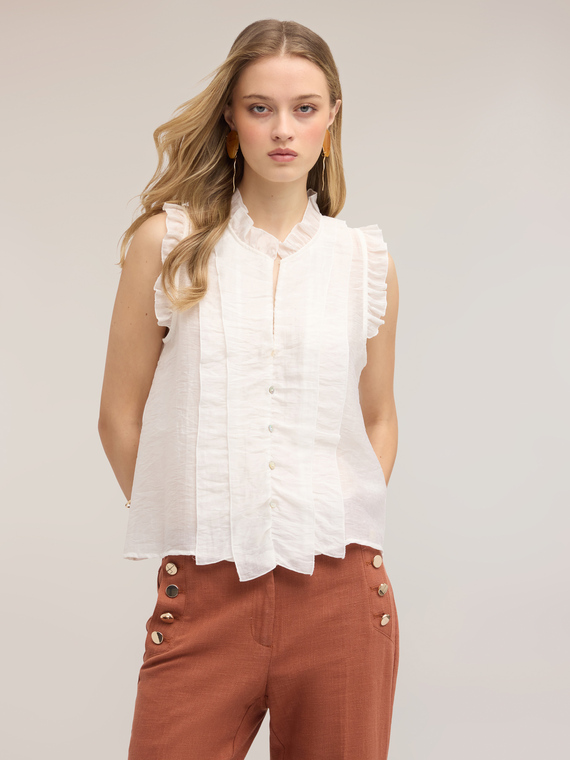 Blusa in mussola con volant