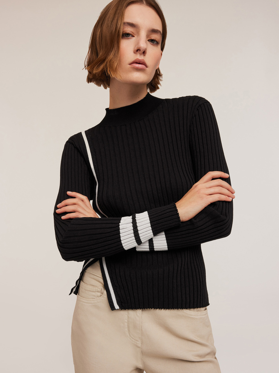 Funnel neck sweater with slit at hem