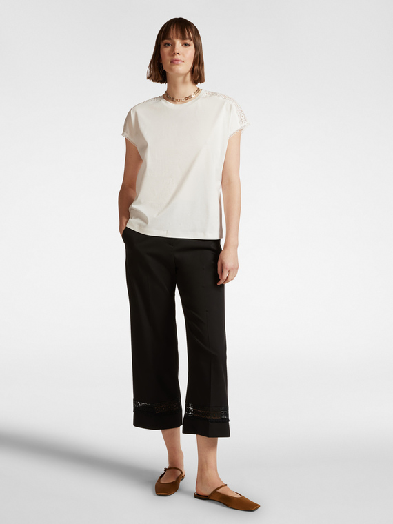 Cropped trousers with embroidered trim