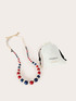 Collana lunga con perline in legno e rafia image number 3