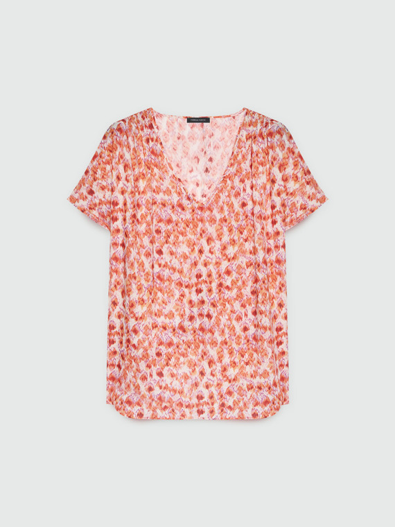 Blusa stampata con scollo a V