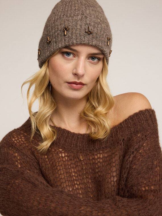 Knit hat with applied stones