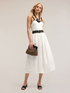 Dual fabric dress with circle skirt image number 0
