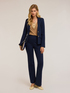 Pantaloni flare con motivo occhielli image number 0