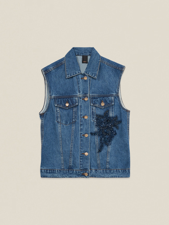 Denim vest with floral appliqué