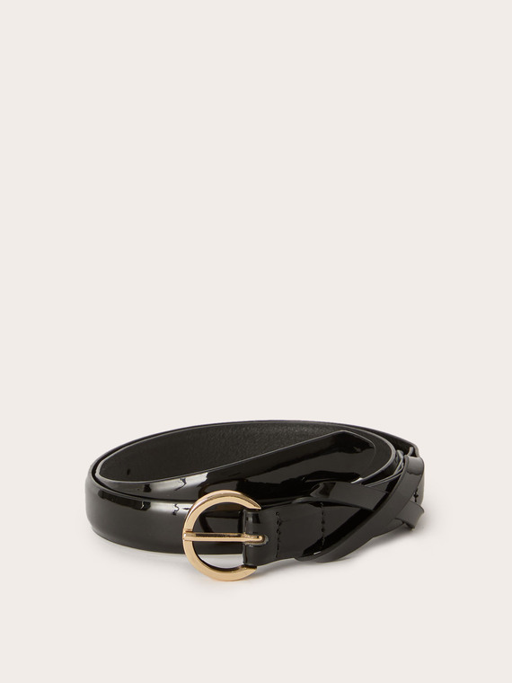 Patent leather belt with crossover keeper loop
