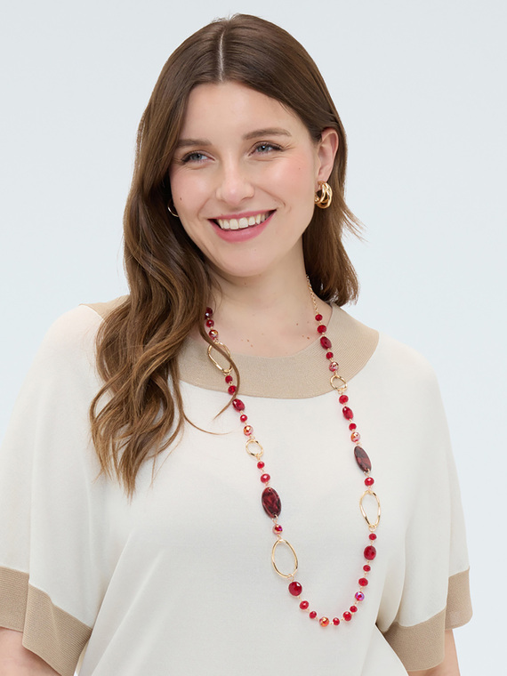 Collana lunga con perline e anelli