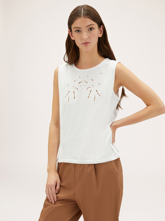 Top with butterfly embroidery