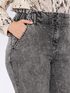 Balloon jeans with used effect and luminous appliqués image number 3