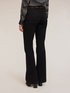 Jeans flare con alamari in metallo image number 1