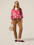 Chino pants with decorative chain image number 0