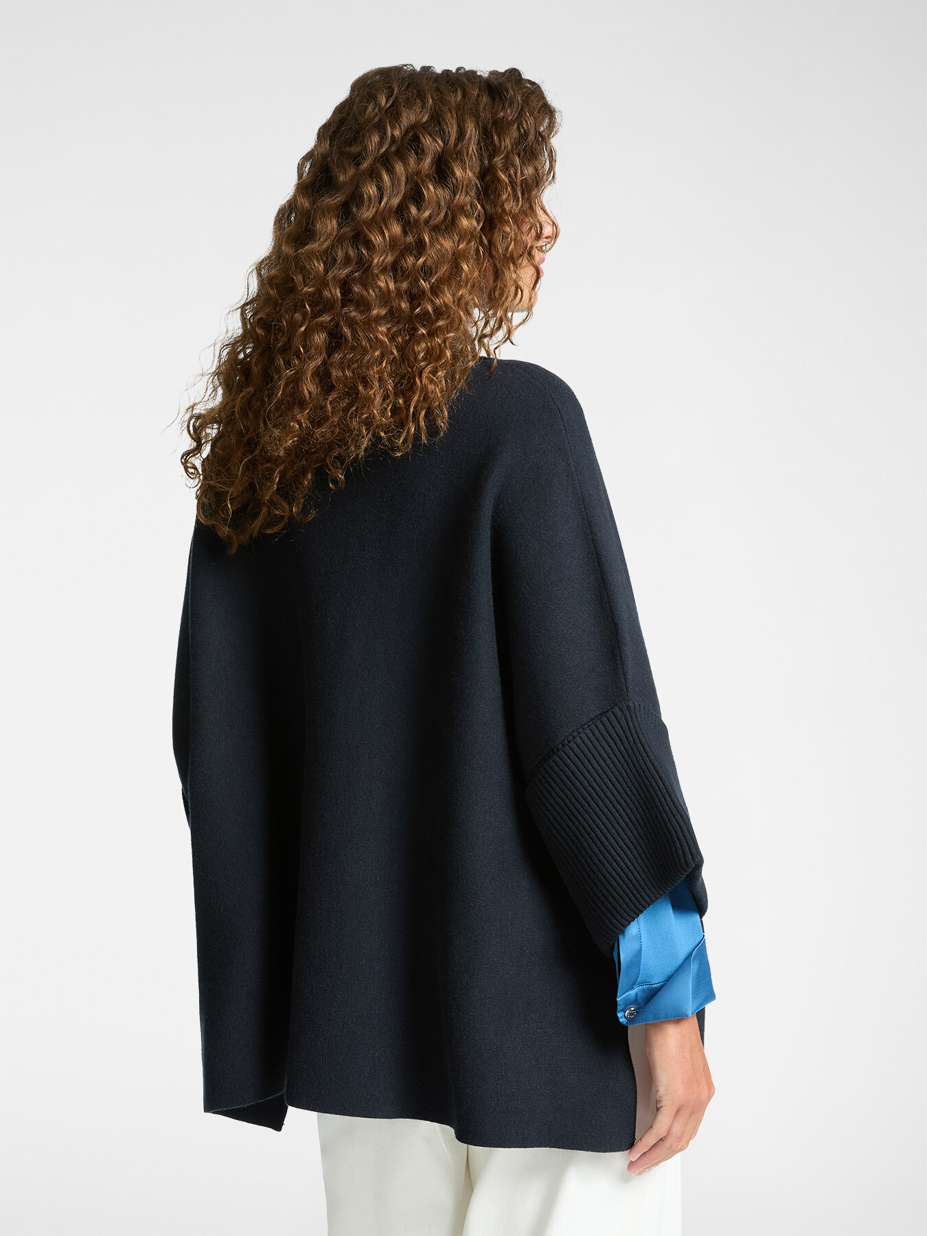 Knitted cape image number 1