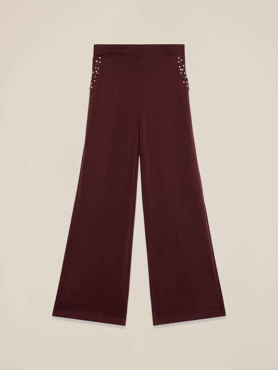 Pantaloni palazzo in scuba con castoni