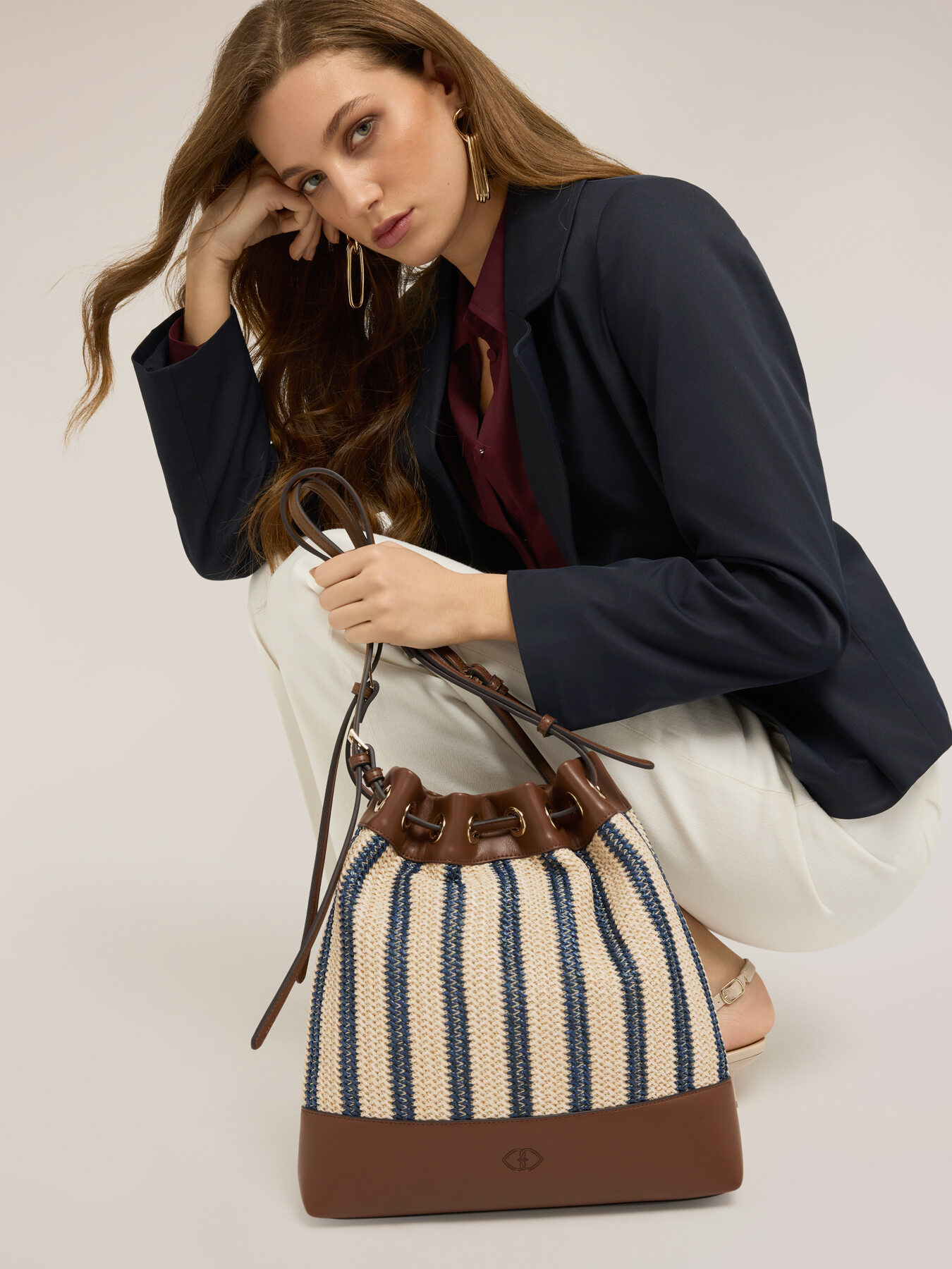 Striped woven bucket bag image number 0