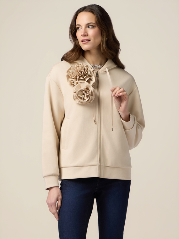 Zip-up sweatshirt with pins and flower