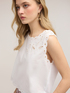 Crop top with openwork embroidery and scalloped edges image number 3
