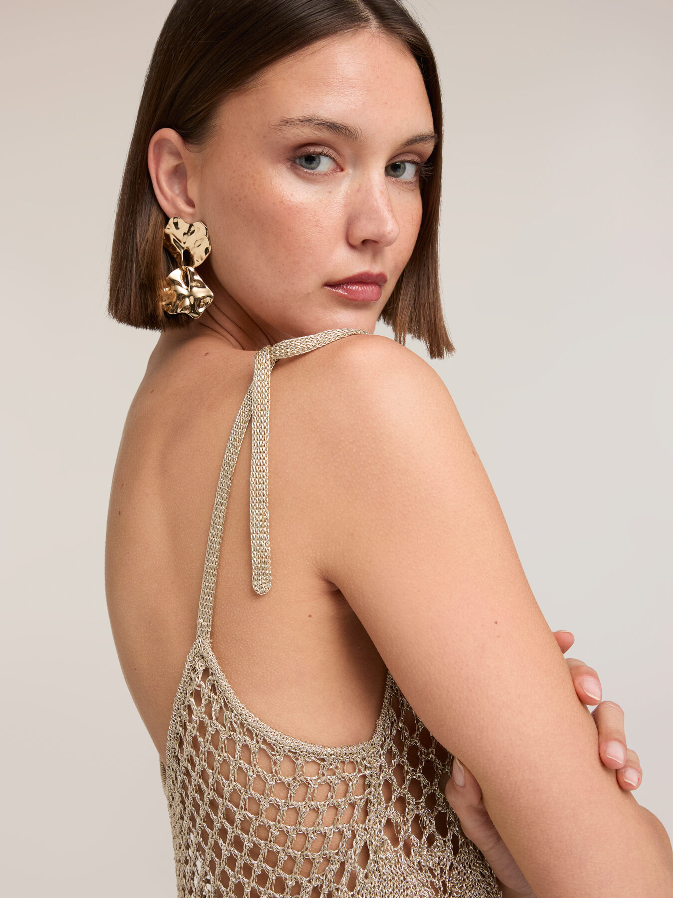 Top aus durchbrochener Strickware in Lurex image number 0