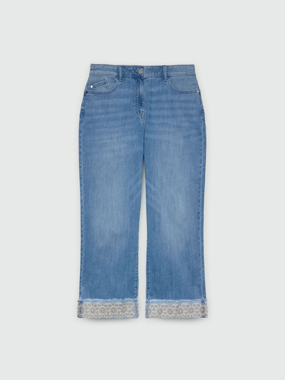 Jeans cropped con bordo in pizzo