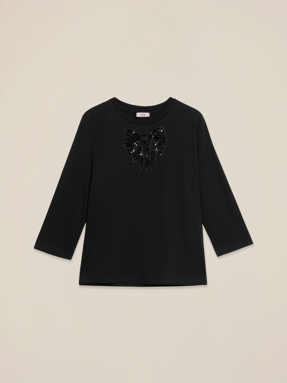 T-shirt con patch in paillettes
