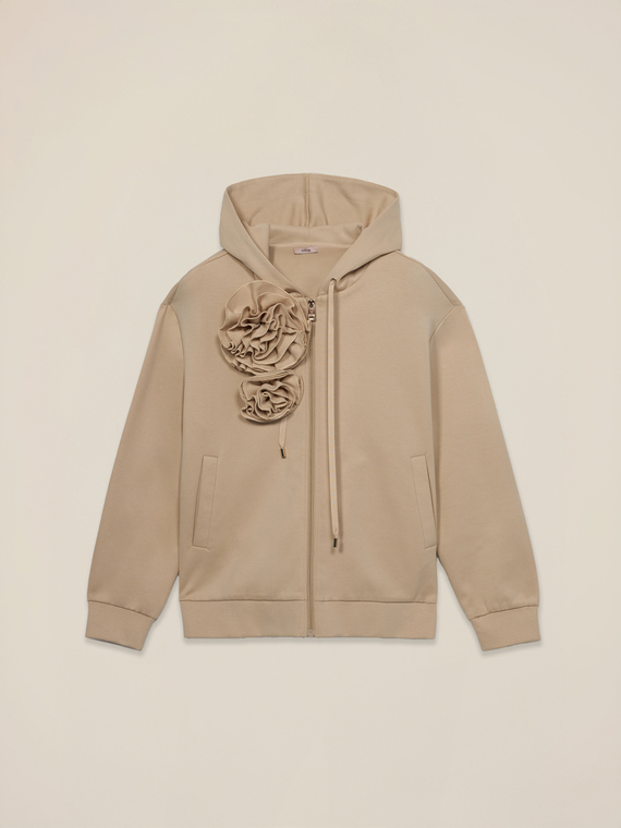 Zip-up sweatshirt with pins and flower