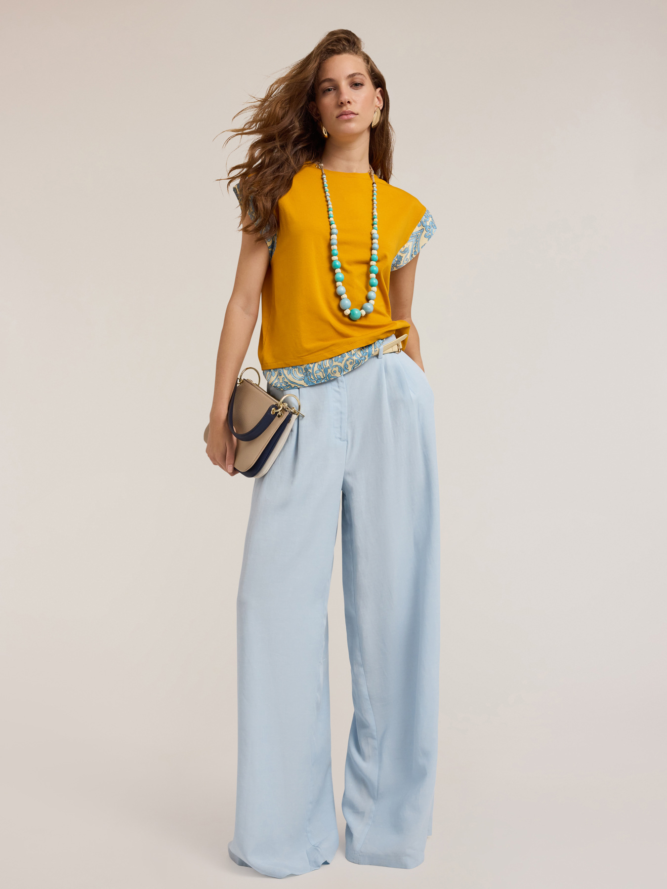 Pleated palazzo trousers in lyocell blend image number 0