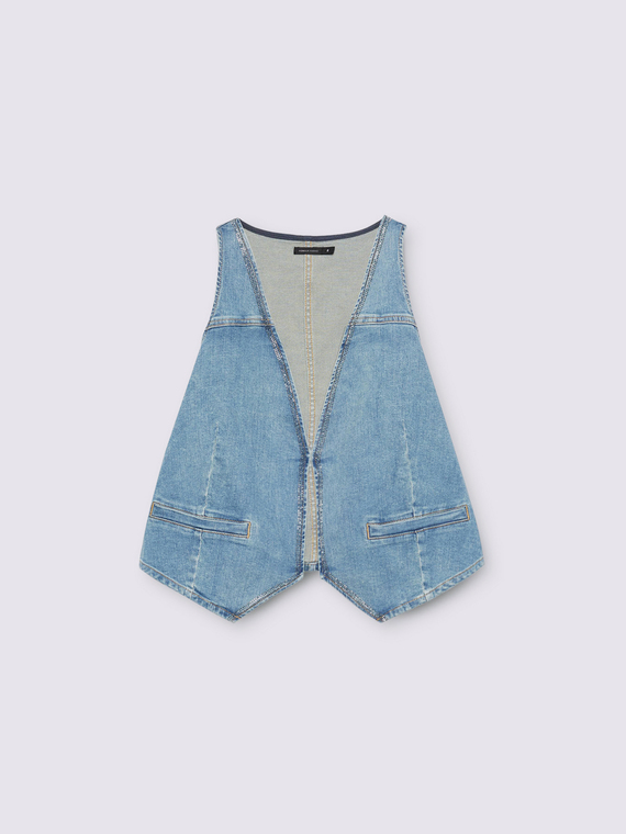 Denim vest with luminous appliqués
