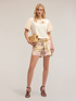 T-shirt with jewelled brooch and feathers image number 2