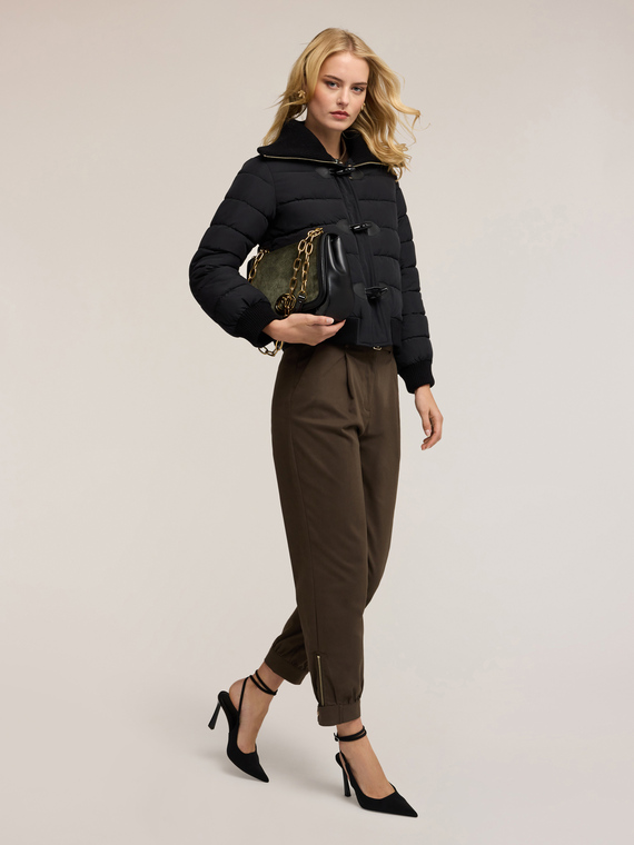 Quilted down jacket with toggle closures