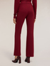 Flare pants with eyelet pattern image number 1